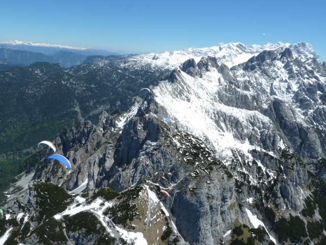  Snowy mountains and paragliding 